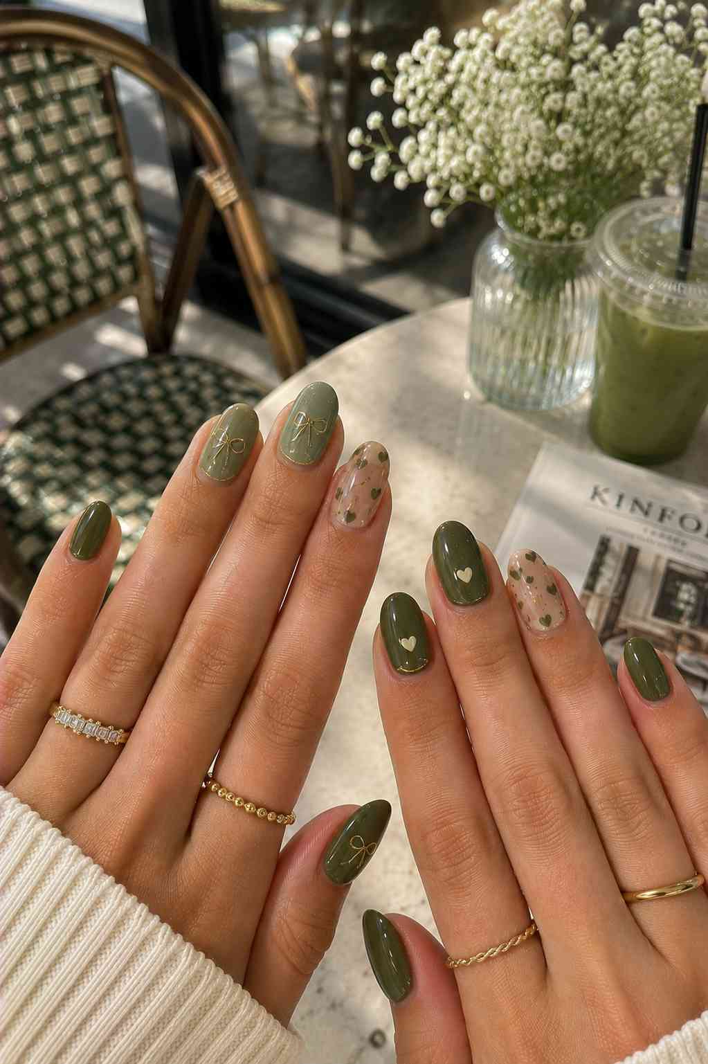Glossy olive nails with gold bow line art and sheer nude nails featuring a tiny olive heart print