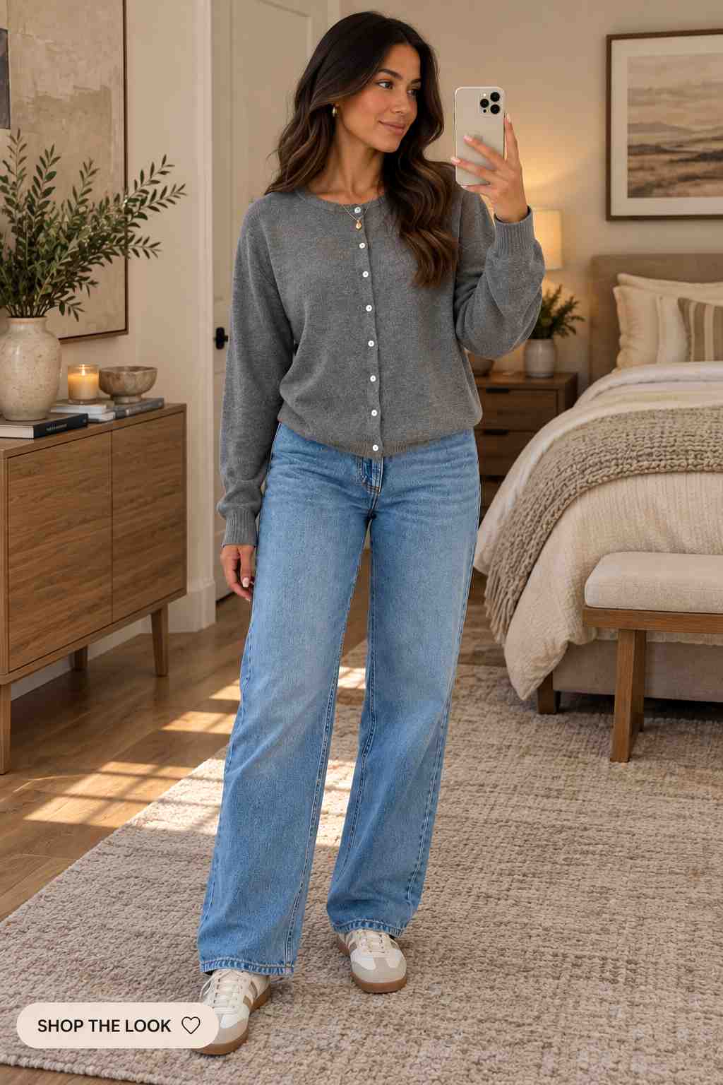 Gray button-up cardigan with light wash wide-leg jeans and sneakers