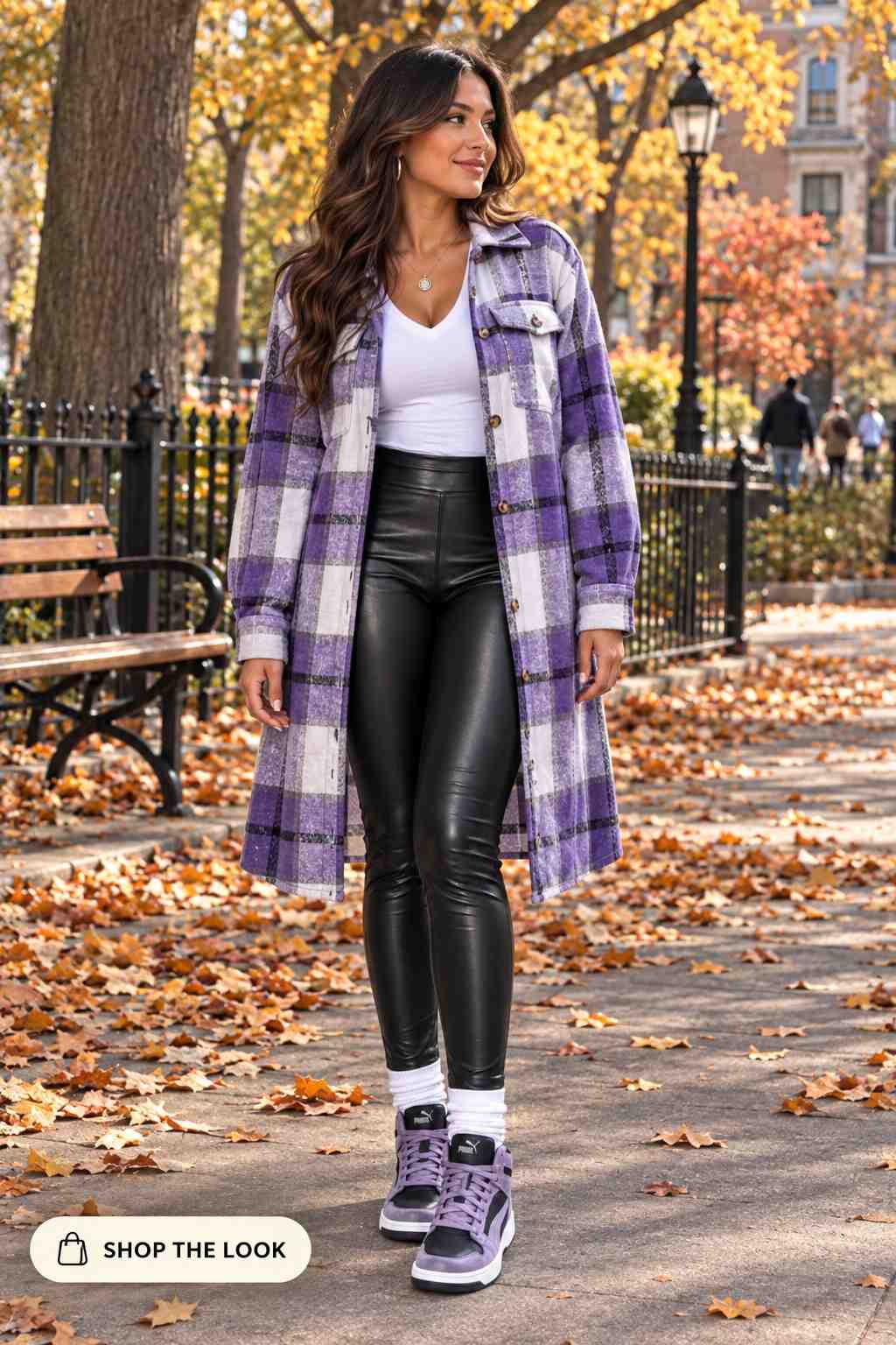 Woman in lavender plaid shacket with faux leather leggings and purple sneakers