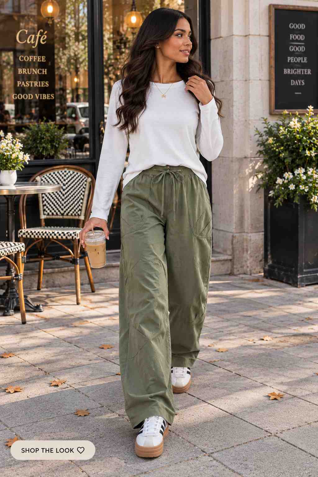 White long sleeve top with olive green wide-leg cargo pants